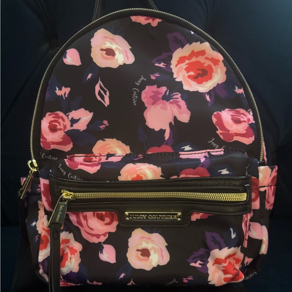 Juicy Couture backpack. Super roomy inside. Super cute.